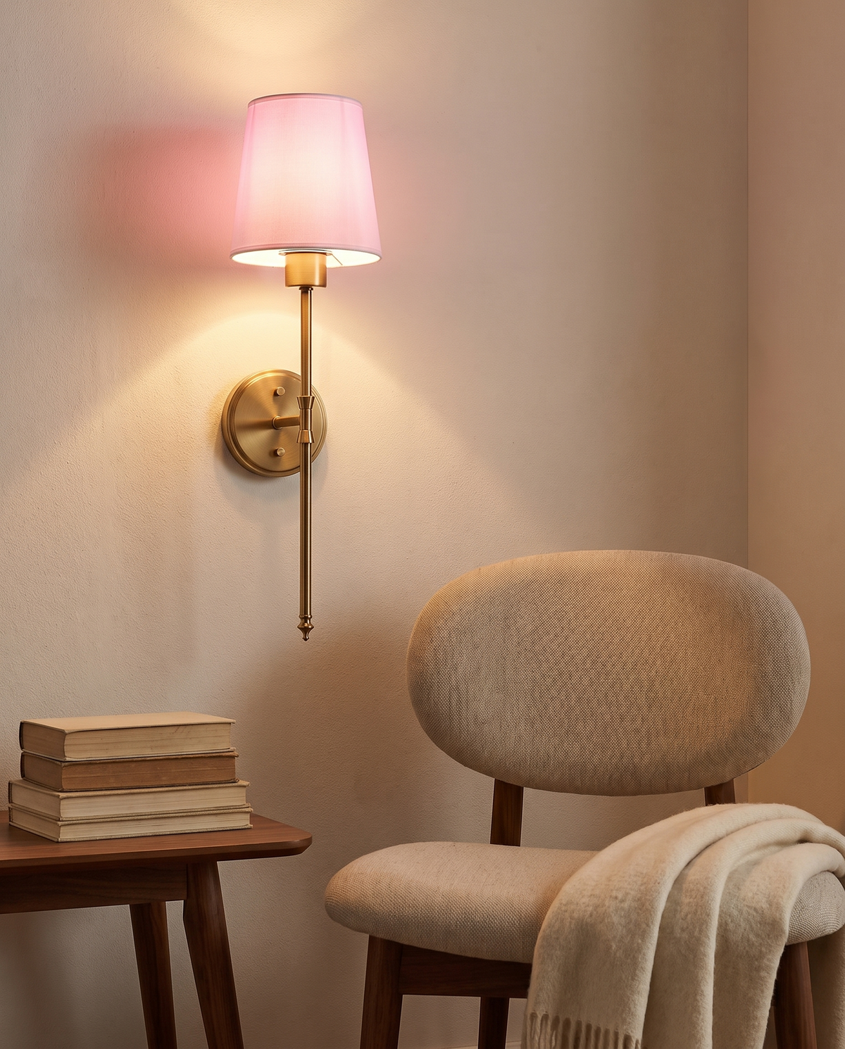 Wireless wall sconce above a reading chair, Wick & Wool